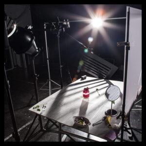 A behind-the-scenes photo of a beverage food photography photo shoot by eCommerceImages.com