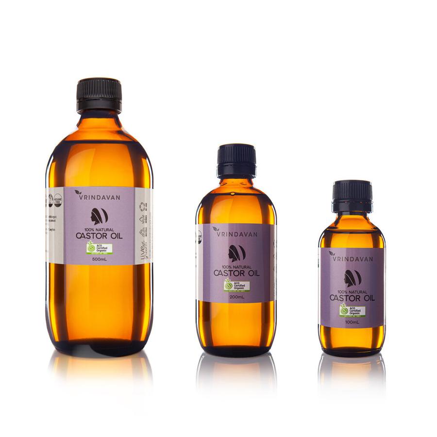 A high-quality product shot of 3 essential oil bottles made from amber-coloured glass